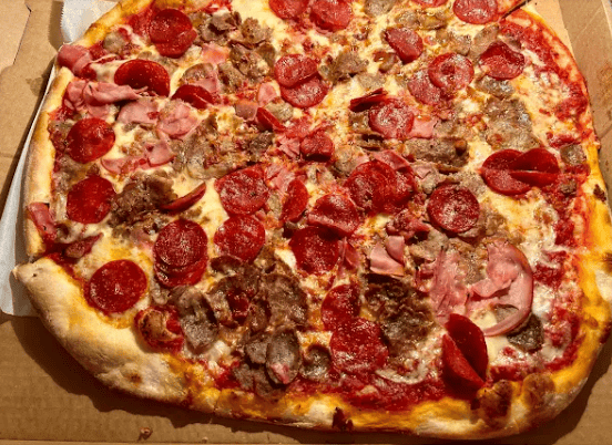 Delicious specialty pizza served hot from the oven